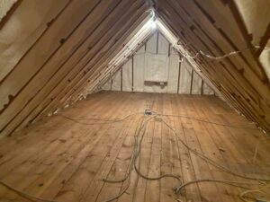 Image of spray foam insulation in attic.